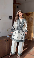 Aarika Ivory Black Embroidered Cotton Kurta Pant Set