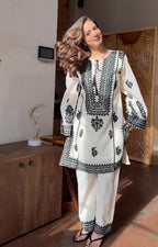 Aarika Ivory Black Embroidered Cotton Kurta Pant Set