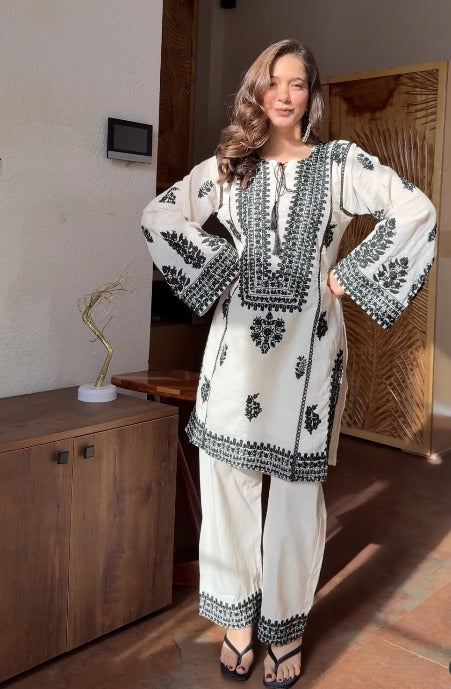 Aarika Ivory Black Embroidered Cotton Kurta Pant Set